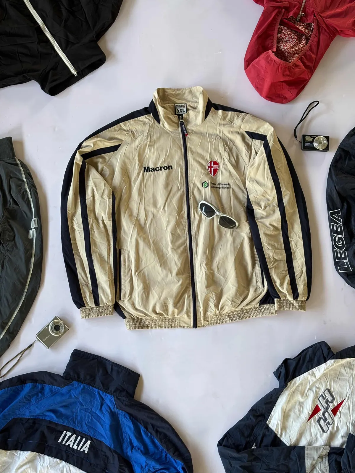 Macron Track Top, beige / navy track top laid flat