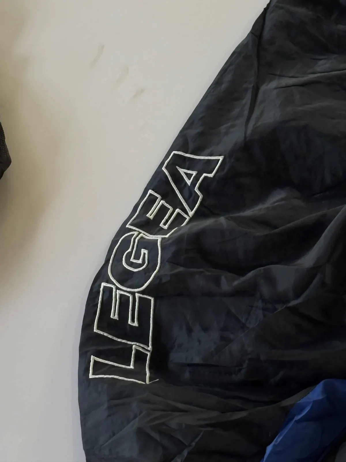 Close-up of the legea sleeve print